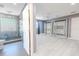 Spacious main bedroom with open closet and glass-enclosed shower at 2121 Park N St, St Petersburg, FL 33710