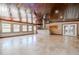 Large sunroom showcasing tile flooring, a wood plank ceiling, and an open concept layout with ample light at 2121 Park N St, St Petersburg, FL 33710