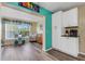Open living space features a view to a sitting area with large window at 2401 Ecuadorian Way # 57, Clearwater, FL 33763