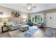Bright and airy living room with modern furnishings, stylish decor and lots of natural light at 2401 Ecuadorian Way # 57, Clearwater, FL 33763