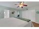 Spacious bedroom with ensuite bath, sliding door, and closet at 2401 Ecuadorian Way # 57, Clearwater, FL 33763