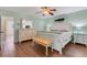 Beautiful bedroom with ensuite bath, updated floors, and bright, airy feel at 2401 Ecuadorian Way # 57, Clearwater, FL 33763