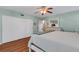 Light and bright main bedroom with walk-in closet and decorative accents at 2401 Ecuadorian Way # 57, Clearwater, FL 33763