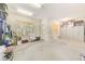 Well-lit garage featuring storage cabinets and a large window at 250 Seagate Ct, Dunedin, FL 34698