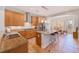 Gourmet kitchen featuring an island, stainless appliances, and a breakfast nook at 250 Seagate Ct, Dunedin, FL 34698