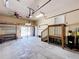The garage features a water heater, room for utilities, access to the backyard, and a staircase at 3105 S Canal Dr, Palm Harbor, FL 34684