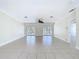 Spacious living room with lots of light coming in through sliding glass doors at 3105 S Canal Dr, Palm Harbor, FL 34684