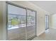 Bright view of the outdoor patio through sliding glass doors at 3105 S Canal Dr, Palm Harbor, FL 34684