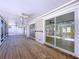 Large screened-in porch with backyard view at 3105 S Canal Dr, Palm Harbor, FL 34684