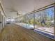 Open porch with view to the pool and backyard at 3105 S Canal Dr, Palm Harbor, FL 34684
