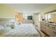 Relaxing bedroom with plenty of storage and a light color palette at 5095 Bay Ne St # 103, St Petersburg, FL 33703