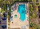 Overhead shot of a community pool and lounging area, with adjacent parking at 5100 Burchette Rd # 3403, Tampa, FL 33647