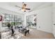 Spacious bonus room with neutral carpet, large windows, and mirrored closet doors at 5100 Burchette Rd # 3403, Tampa, FL 33647