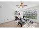 Neutral bonus room with large windows, neutral carpet, and ceiling fan at 5100 Burchette Rd # 3403, Tampa, FL 33647