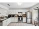Well-lit kitchen featuring sleek appliances, and ample cabinet space at 5100 Burchette Rd # 3403, Tampa, FL 33647