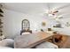 Open-concept living space with a dining table, comfortable sofa, and modern ceiling fans at 5100 Burchette Rd # 3403, Tampa, FL 33647