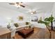 Cozy living room with comfortable seating and a view of the kitchen at 5100 Burchette Rd # 3403, Tampa, FL 33647