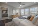 Inviting bedroom offering water views and a glimpse into the connected bathroom at 5351 Bridge St # 99, Tampa, FL 33611