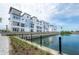Waterfront condos feature a blue and white exterior, balconies, and stunning water views at 5351 Bridge St # 99, Tampa, FL 33611