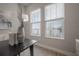 Close-up of home office details, including stylish decor and picturesque water view at 5351 Bridge St # 99, Tampa, FL 33611