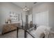 Bright office with modern lighting, neutral decor, and wood-look tile flooring at 5351 Bridge St # 99, Tampa, FL 33611