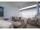 Outdoor patio with wicker furniture, beige flooring, and a partial view of the sky at 5351 Bridge St # 99, Tampa, FL 33611