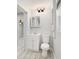Bathroom featuring a modern vanity, mirror, and fixtures at 5560 Frances Ave, New Port Richey, FL 34653
