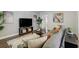 Cozy living room features a comfortable sofa, stylish decor, and a relaxing atmosphere at 609 Osceola Rd, Belleair, FL 33756