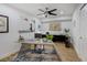 Bright office with unique industrial desk, modern ceiling fan and ample space for productivity at 609 Osceola Rd, Belleair, FL 33756