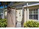 Enjoy the outdoors with a private outdoor shower featuring wood accents and lush greenery at 609 Osceola Rd, Belleair, FL 33756