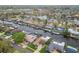 Waterfront homes line canal with mature trees and beautiful landscaping at 6109 Schooner Way, Tampa, FL 33615