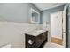 Updated bathroom features modern vanity with granite countertops and stylish subway tile backsplash at 6109 Schooner Way, Tampa, FL 33615