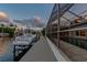 Beautiful waterfront home with a private boat lift and dock, offering seamless access to the water for boating enthusiasts at 6109 Schooner Way, Tampa, FL 33615