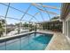 Private waterfront home offers a beautiful pool and boat dock, ideal for entertainment at 6109 Schooner Way, Tampa, FL 33615