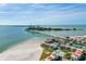 Gorgeous aerial view of beachfront condos, pool, and beach access at 706 Bayway Blvd # 301, Clearwater Beach, FL 33767