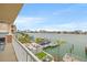 Balcony overlooking scenic water views, docks, and city skyline at 706 Bayway Blvd # 301, Clearwater Beach, FL 33767