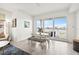 Dining area featuring a neutral color scheme and water views at 706 Bayway Blvd # 301, Clearwater Beach, FL 33767