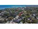 Aerial view showcasing the home's location, surrounding neighborhood, and proximity to the water at 725 Philippe Pkwy, Safety Harbor, FL 34695