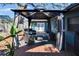 Outdoor patio featuring a gazebo, stylish seating, and a well-maintained wood deck perfect for relaxation at 725 Philippe Pkwy, Safety Harbor, FL 34695