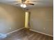 Comfortable bedroom featuring neutral carpeting and ample natural light at 730 S Village N Dr # 101, St Petersburg, FL 33716