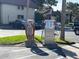Community self-service car wash station with foam spray and vacuum machine in a parking lot at 730 S Village N Dr # 101, St Petersburg, FL 33716