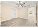 Spacious bedroom features light gray wood-look floors, and neutral walls at 7301 S Swoope St, Tampa, FL 33616