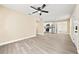 Open-concept living space showcasing modern finishes, a ceiling fan, and seamless flow into the kitchen at 7301 S Swoope St, Tampa, FL 33616