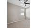 Neutral bedroom with plush carpeting, a ceiling fan, and a window with blinds at 7326 Blue Beech Dr, Riverview, FL 33578