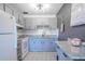 Modern kitchen features new cabinets, countertops, and stainless steel appliances at 8325 112Th St # 202, Seminole, FL 33772