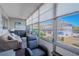 Bright lanai featuring floor to ceiling windows with views of the community at 8325 112Th St # 202, Seminole, FL 33772