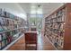 Cozy library with floor-to-ceiling bookshelves and comfortable seating at 8325 112Th St # 202, Seminole, FL 33772