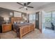 Spacious main bedroom with a ceiling fan, and access to the lanai at 8325 112Th St # 202, Seminole, FL 33772