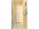 Bright bathroom featuring neutral tones, tile floors, and a towel bar with a gray patterned towel at 9100 Dr Martin Luther King Jr N St # 405, St Petersburg, FL 33702