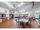 Spacious meeting room with multiple tables, chairs, and bright lighting at 1010 Bowsprit Ln # 0, Holiday, FL 34691